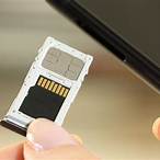 how to open sim card slot on iphone